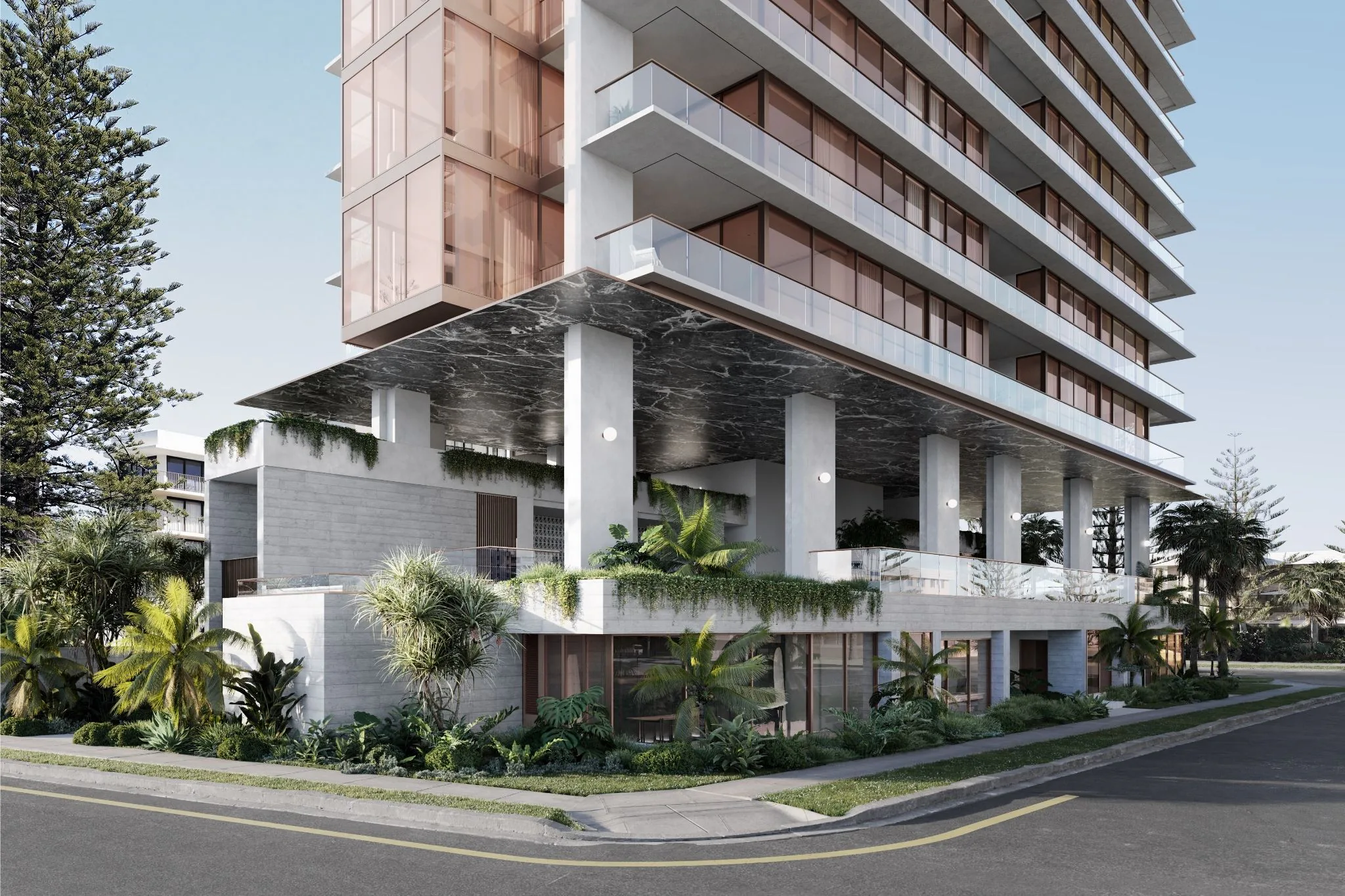 The Sea Glass corner on a Broadbeach street, pines beside it